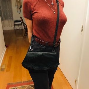 Co-Lab purse and can also be a crossbody. Has a clutch compartment